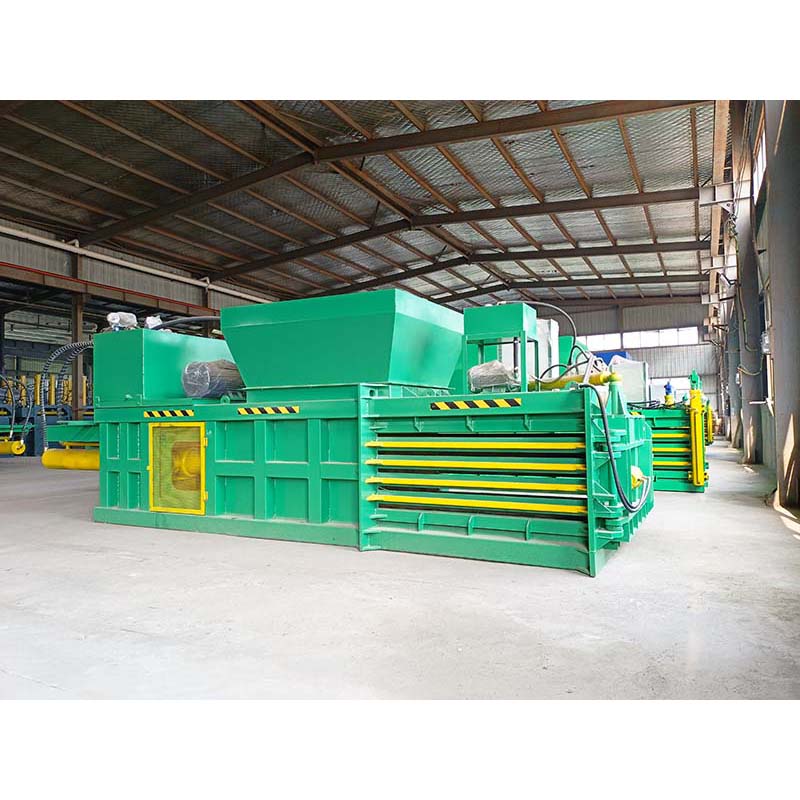 Heavy-duty horizontal baler for continuous and efficient recycling operations.