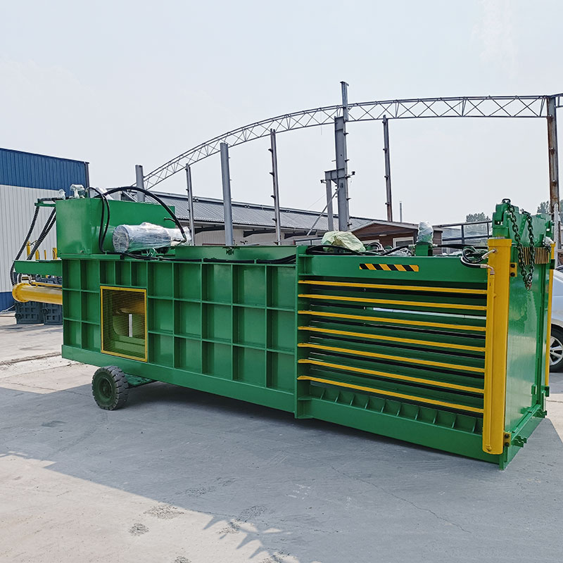 Versatile horizontal baler machine for various materials.