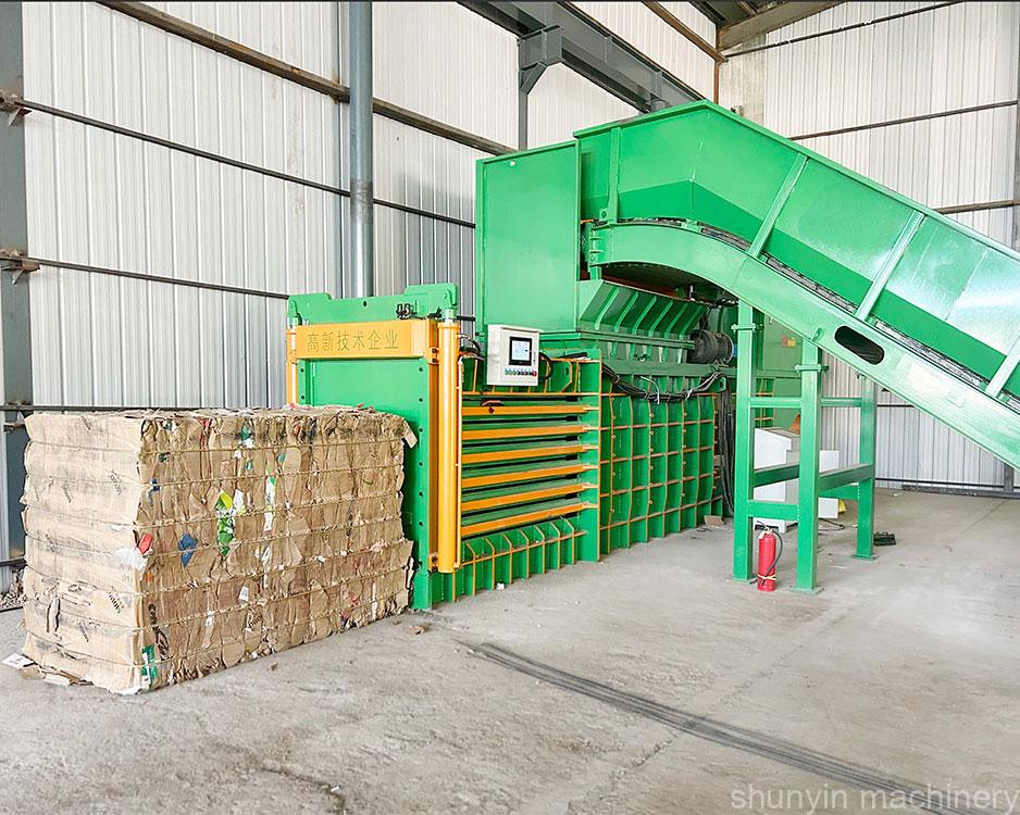 Horizontal baler for efficient waste compaction and industrial recycling solutions.