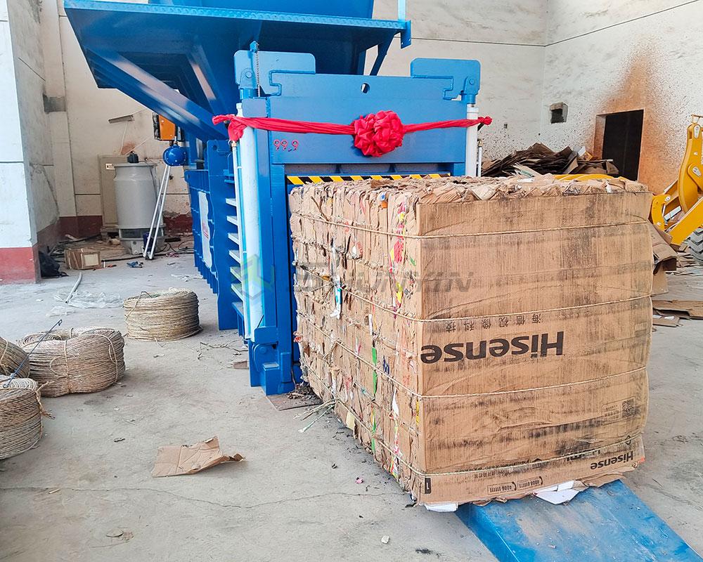 Cardboard sorting for horizontal baler machine input