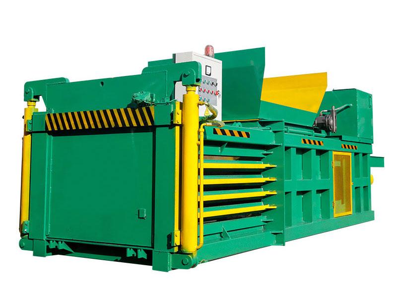 Horizontal waste baling press: Robust horizontal waste baling press for industrial use.