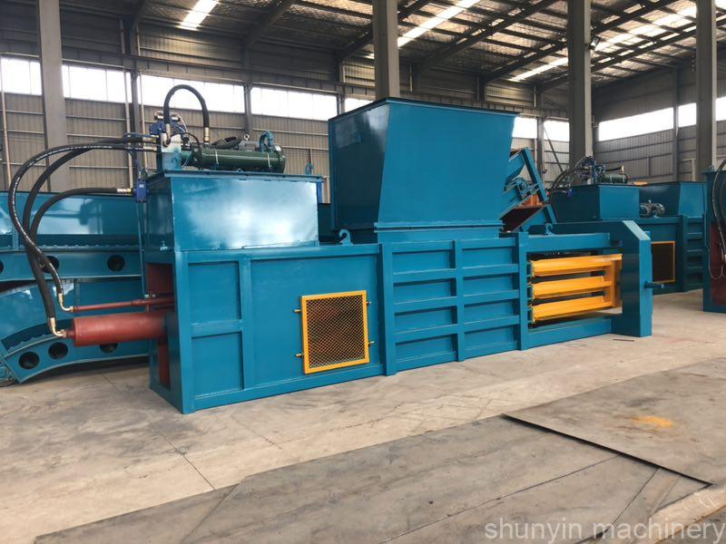 Horizontal material compression baler: Shunyin's baler for material compression operations.