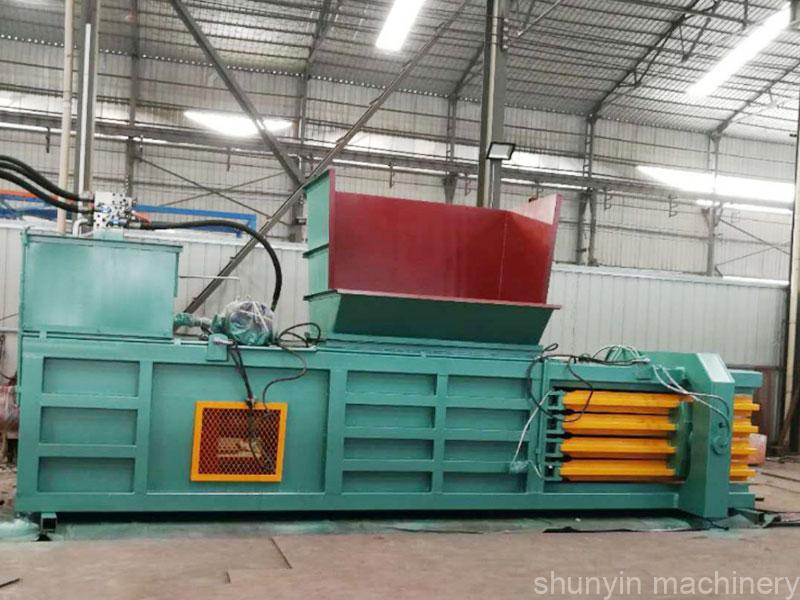 Horizontal recycling compactor machine: Efficient compactor machine for recycling by Shunyin.