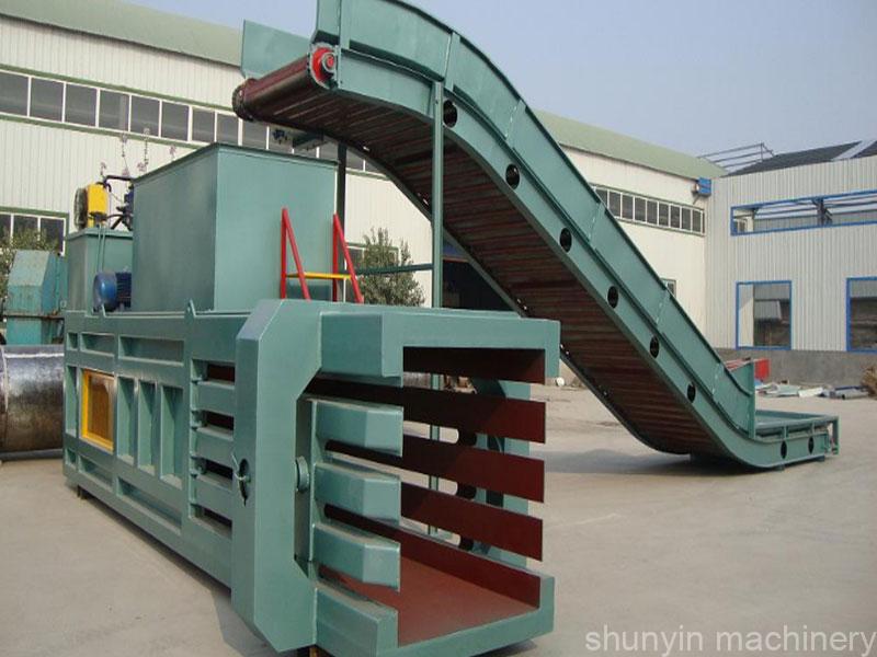 Industrial horizontal waste baling system: Complete baling system for industrial waste by Shunyin.