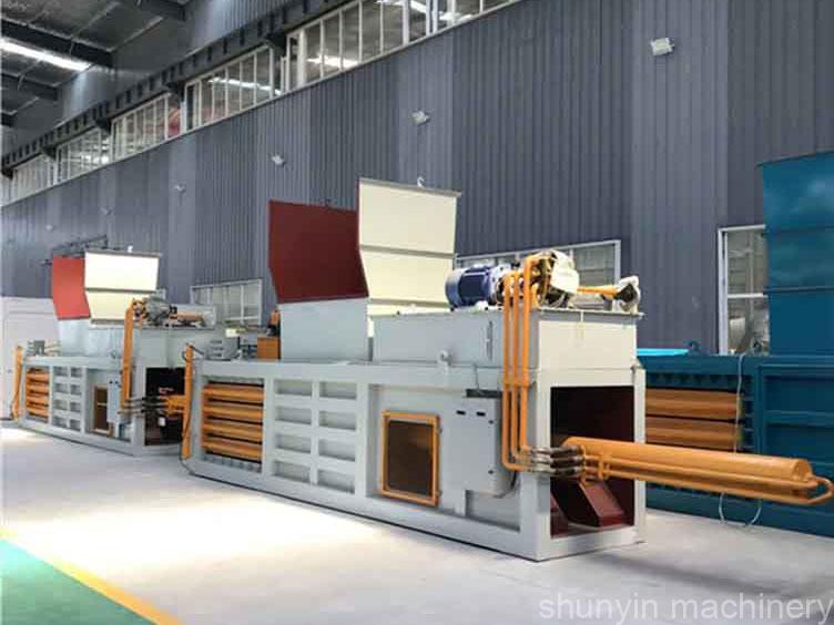 Horizontal waste recycling baler for managing recyclable materials in industries