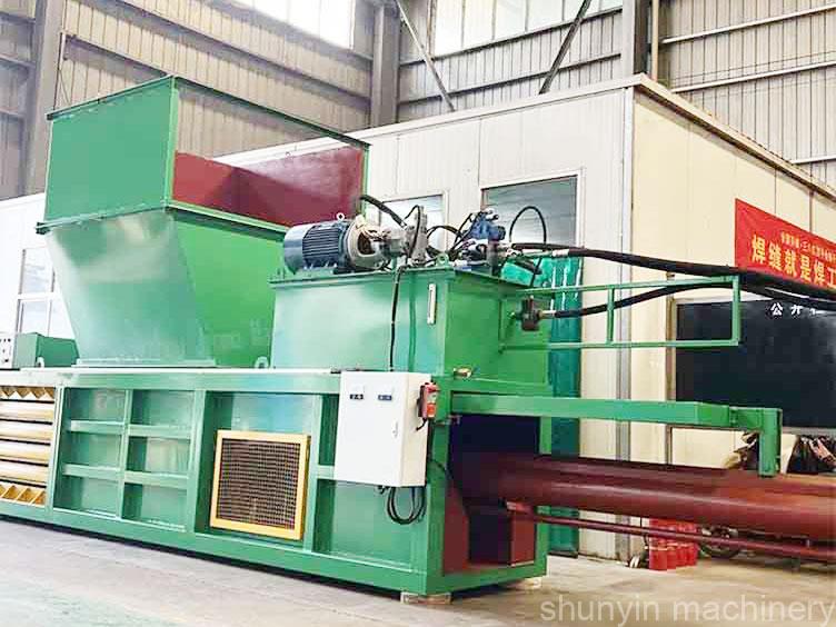 High-performance horizontal baler for sustainable material recycling.