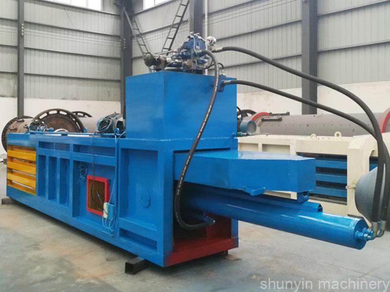 Automatic waste baling machine: Fully automatic machine for baling waste by Shunyin.