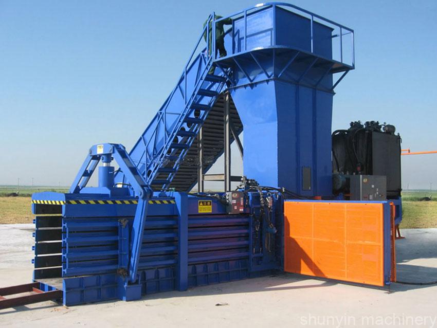 Hydraulic baling press machine for high-efficiency waste compression and packaging.