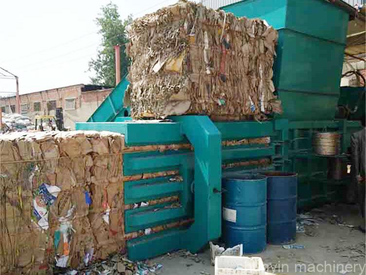 High-capacity automatic waste baler for industrial use