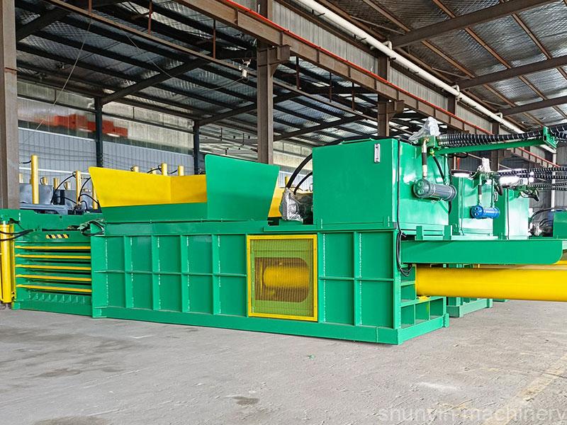 High-capacity horizontal baling machine for industrial recycling operations.