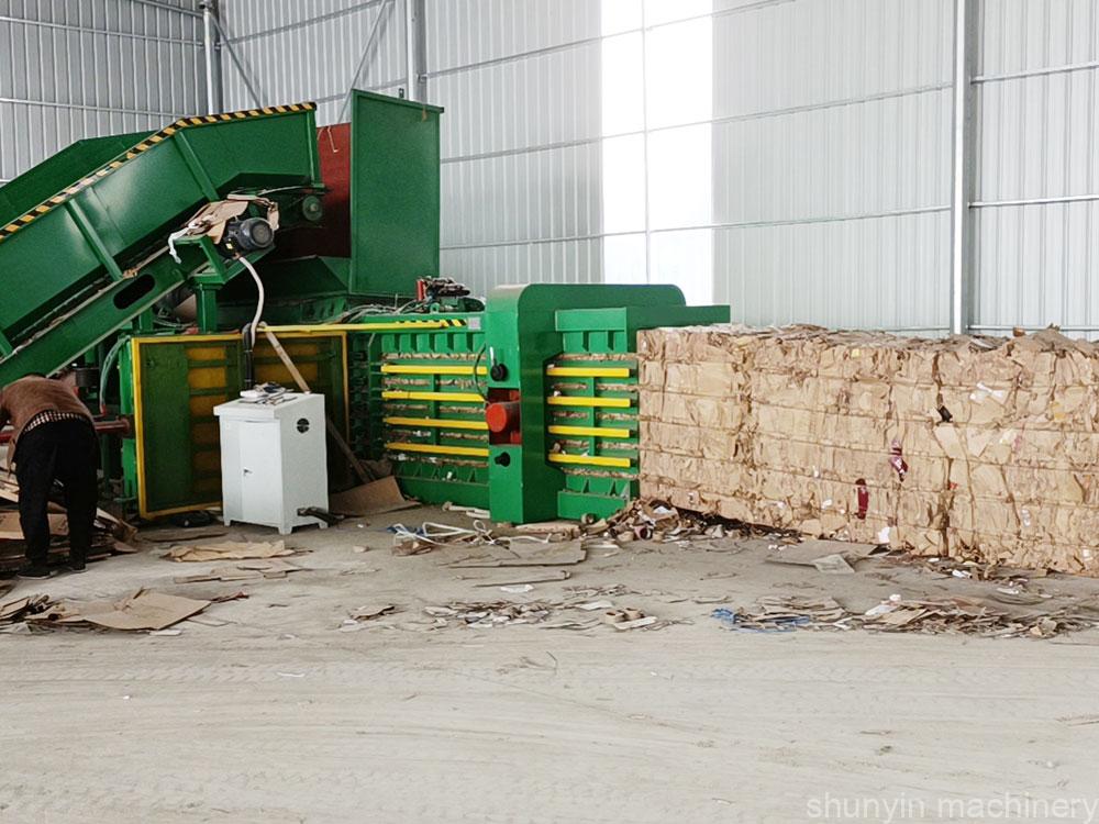 Horizontal baling press for recyclables to optimize waste management processes