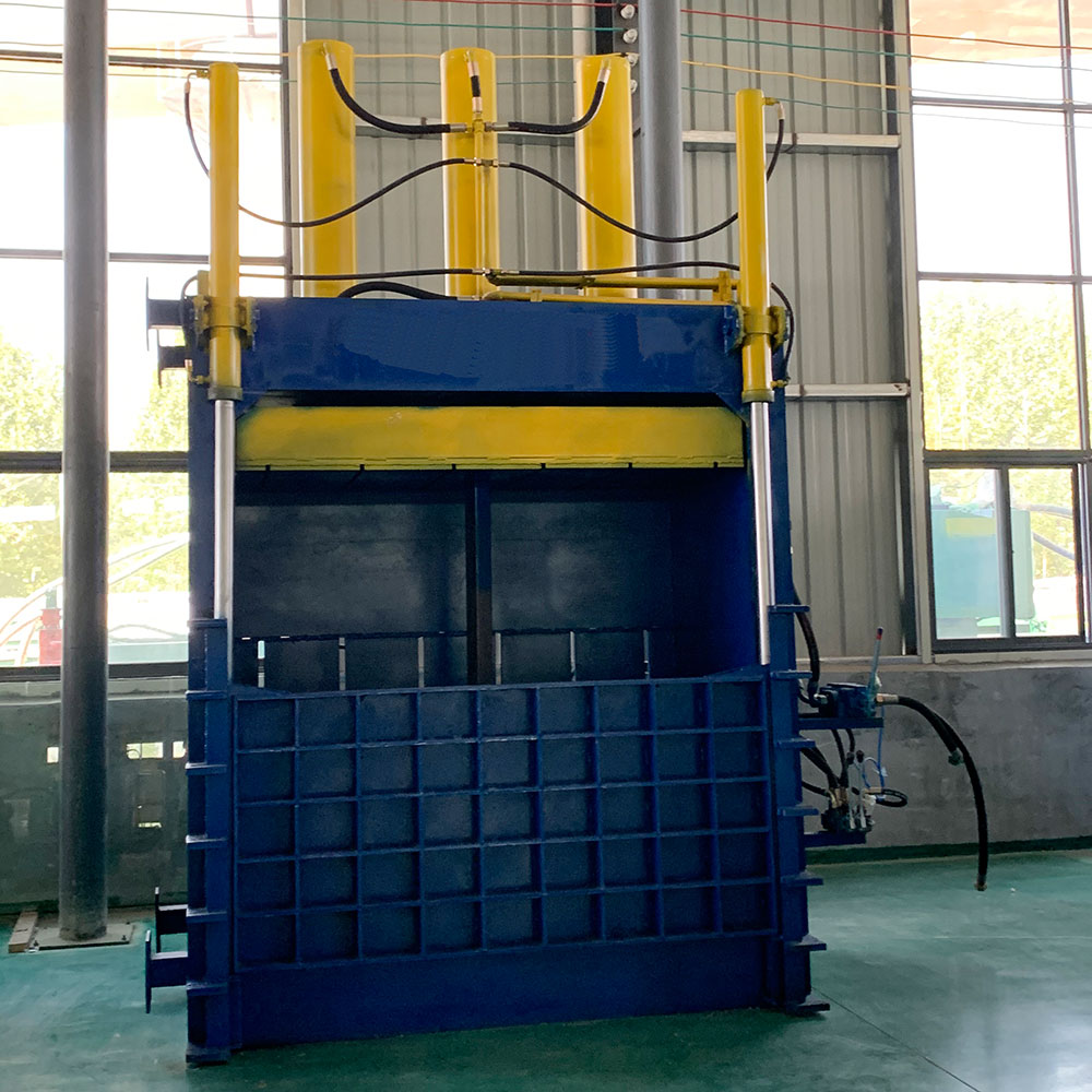 High-capacity vertical baler designed for heavy-duty waste processing.