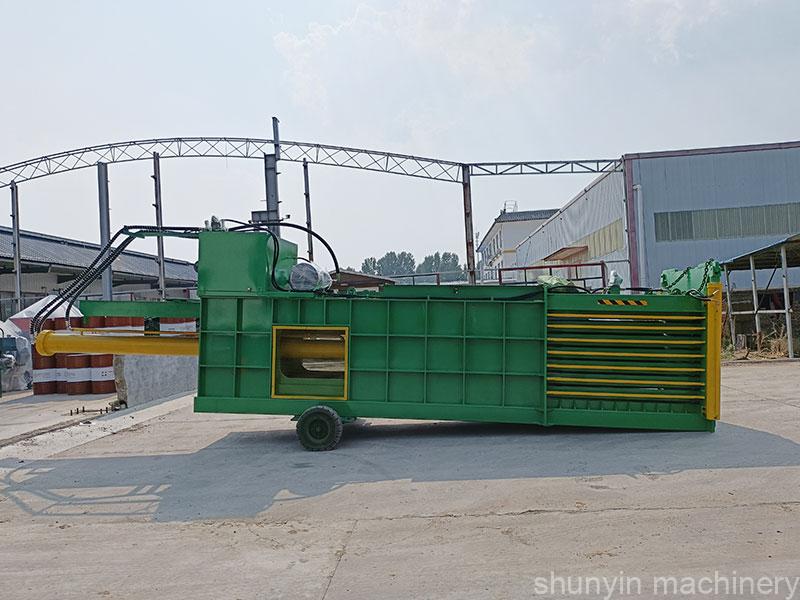 Efficient horizontal baler for diverse material recycling applications.