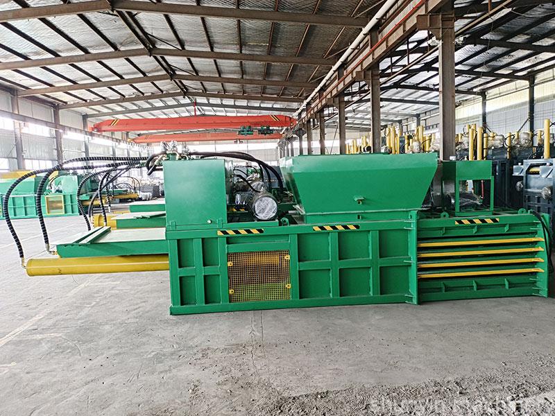 Heavy-duty hydraulic baler for large-scale cardboard waste management