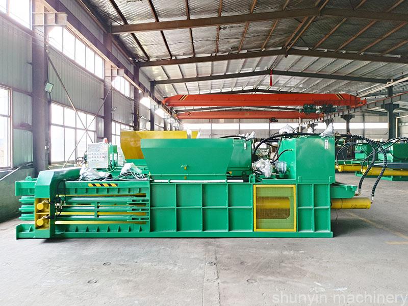 Reliable baler for horizontal waste recycling operations.