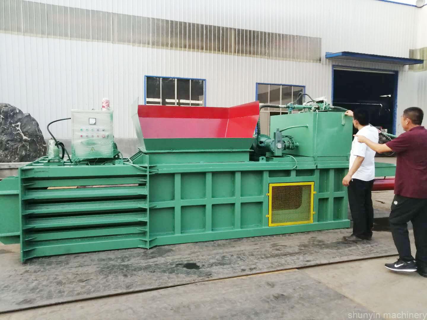 Horizontal waste recycling baler for compacting and processing recyclables