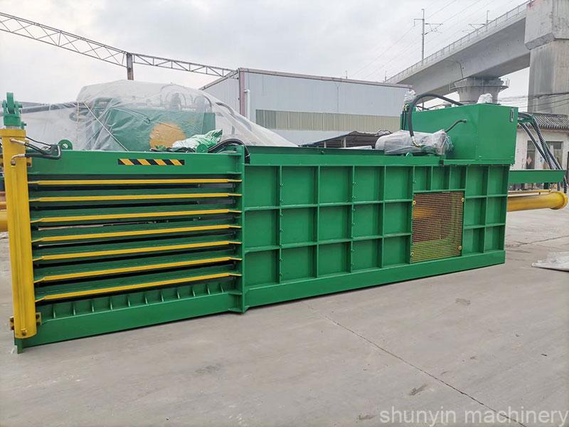 Reliable horizontal baling machine for paper waste management by Shunyin.