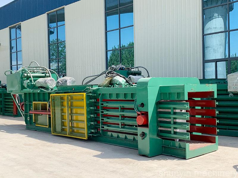 Automatic horizontal waste baler machine for high-volume material processing