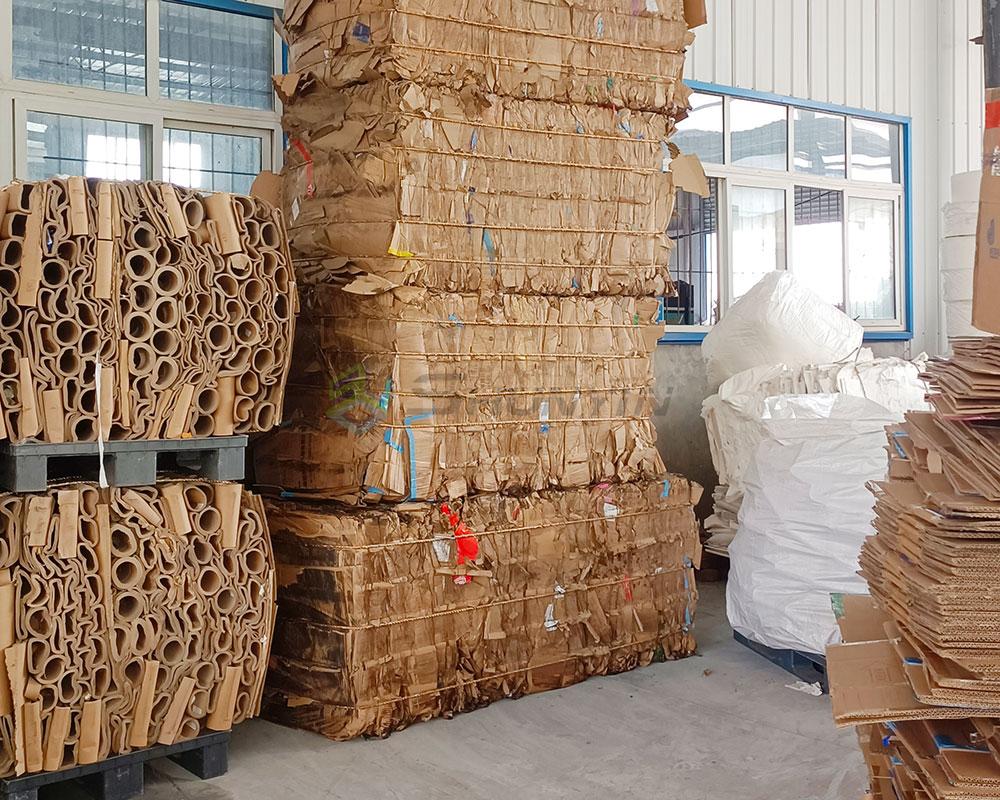 Compact and efficient design of a horizontal baling machine for waste management.