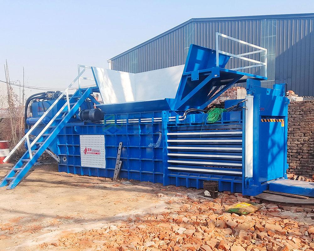 Durable horizontal baler for high-volume material compression.