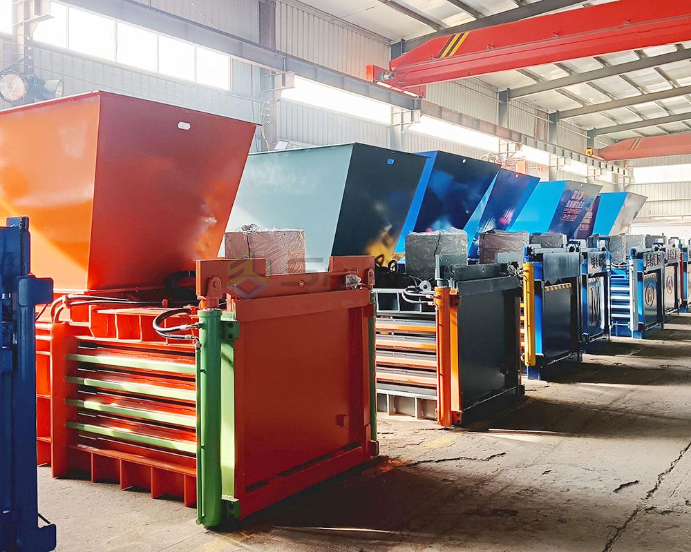 Durable horizontal baler ideal for industrial waste recycling and compacting.