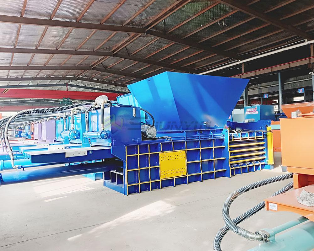 Powerful horizontal waste press machine designed for high-volume waste reduction.