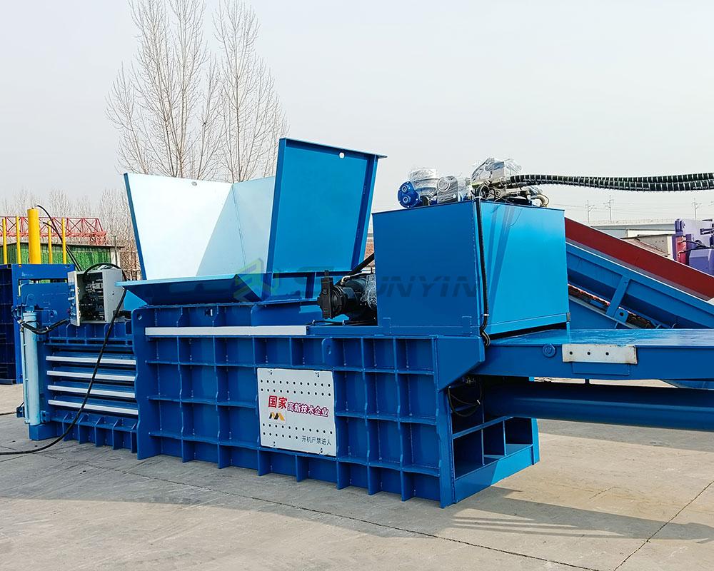 Durable and powerful horizontal baler designed for industrial-scale waste compression.