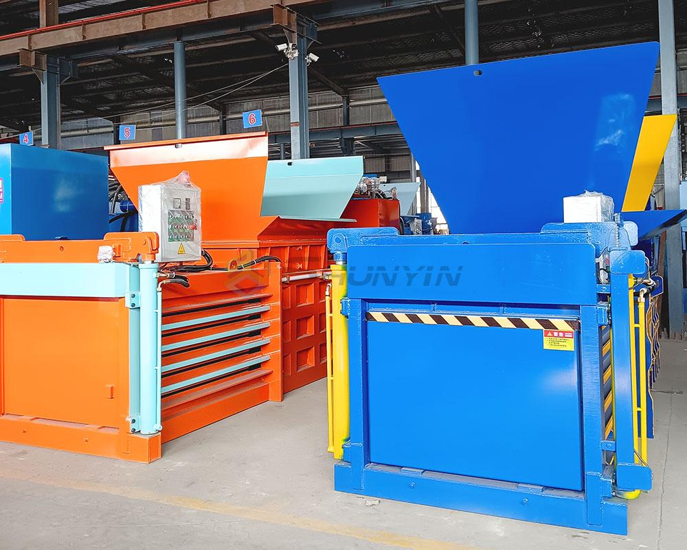 Heavy-duty horizontal compression baler for dense material packing.