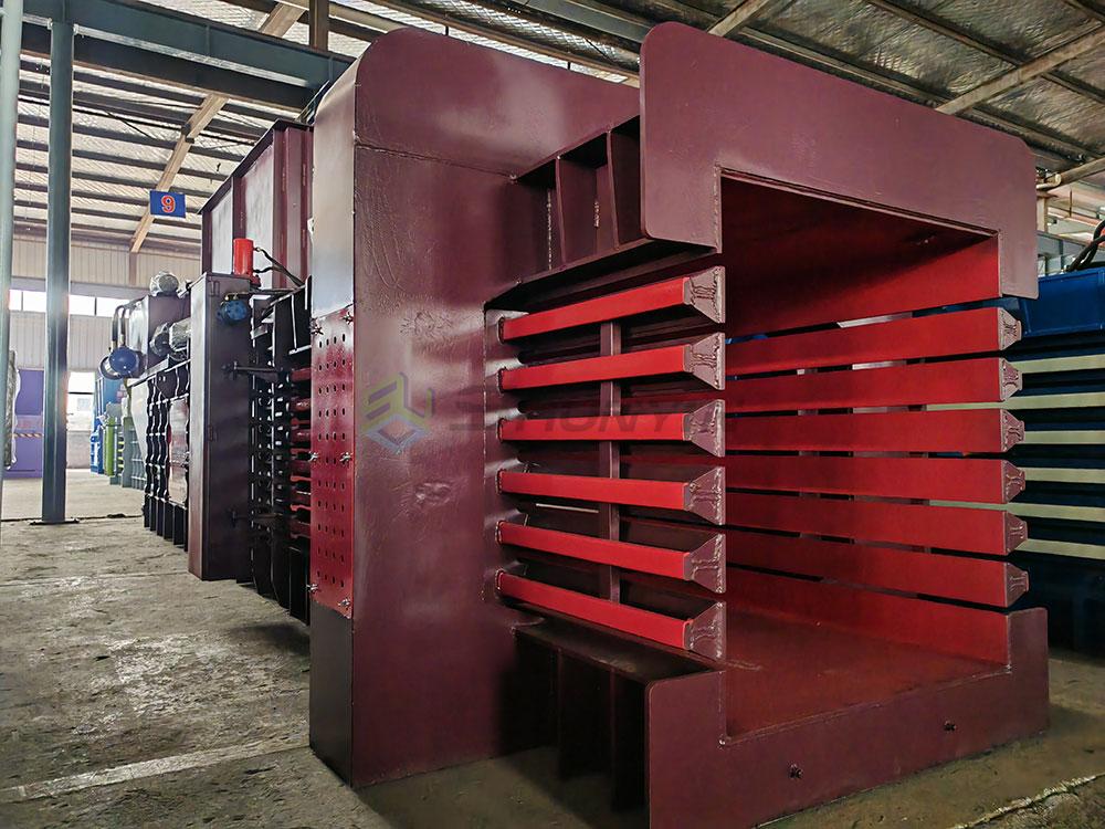 Robust horizontal baler for easy and efficient plastic recycling and compacting.