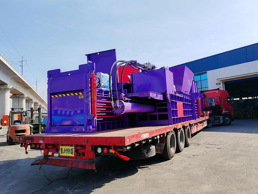 High-volume horizontal baler for industrial and commercial use.