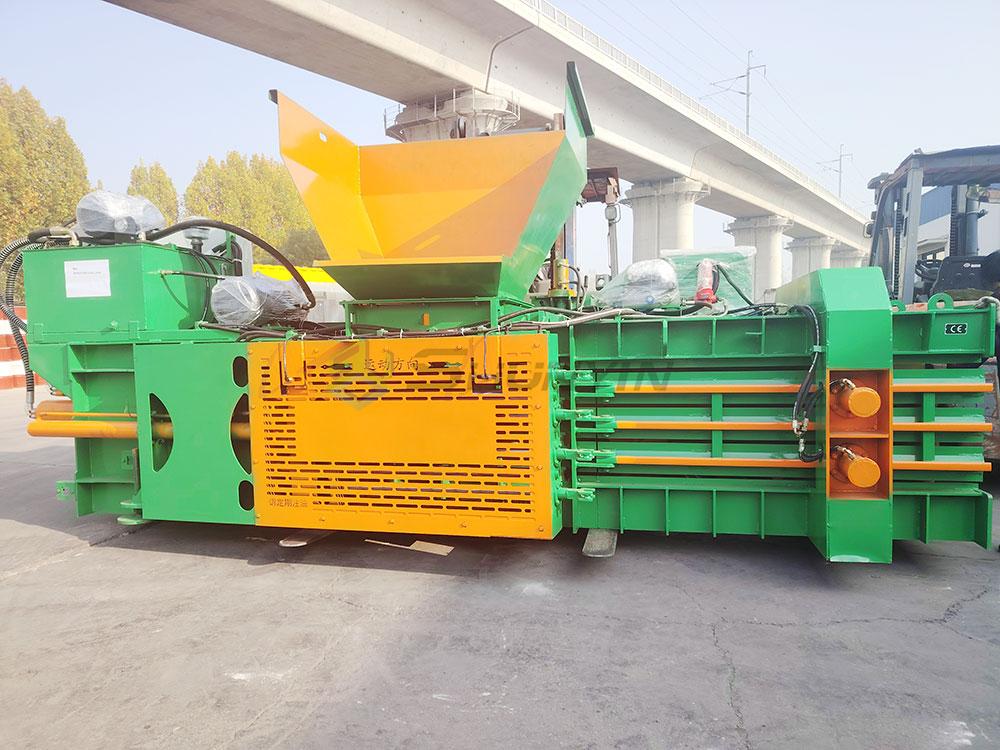 quality control inspector testing hydraulic baler machine safety features