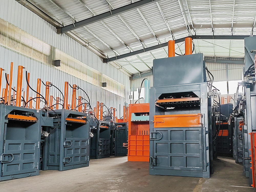 Industrial baler machine compacting cardboard boxes recycling baler machine