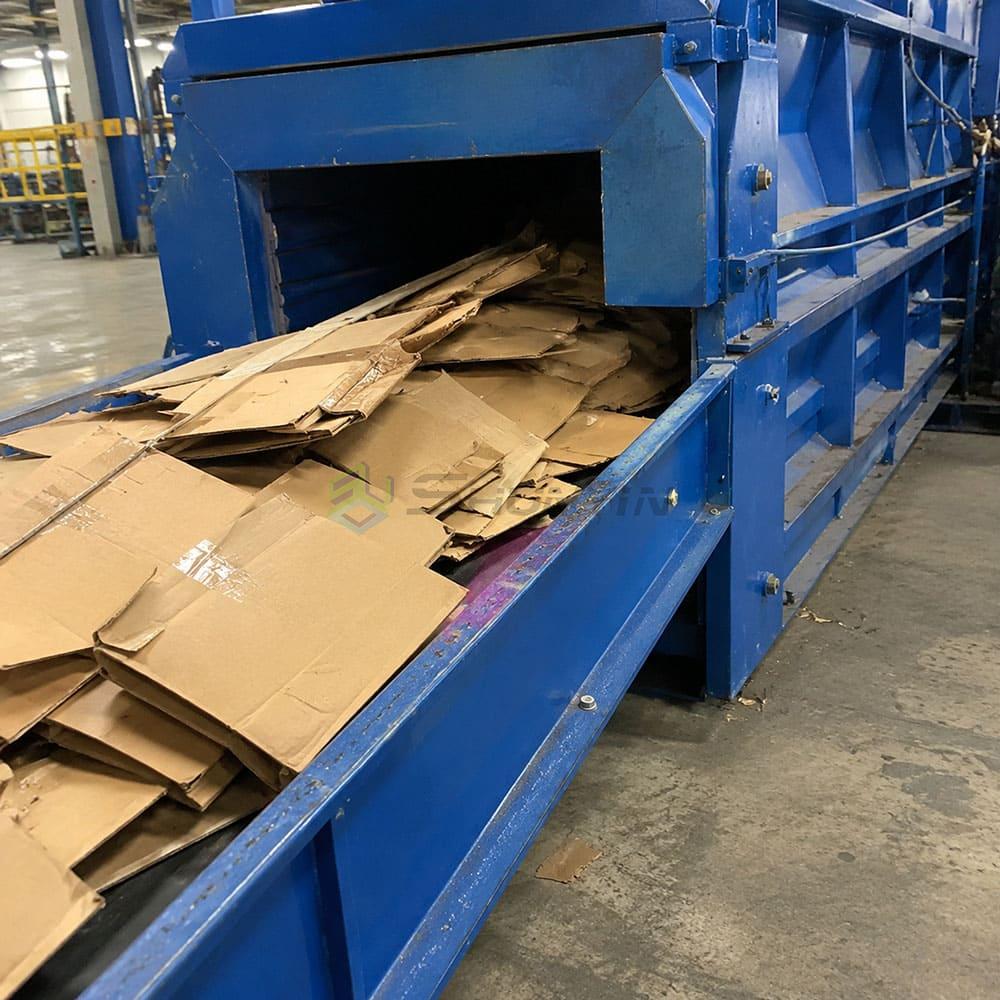 Horizontal baler processing OCC cardboard horizontal baler processing cardboard OCC