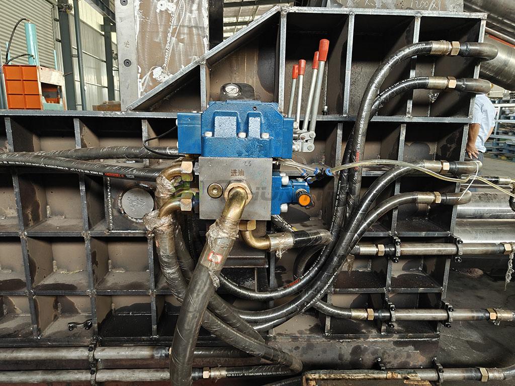 Metal briquetting press produces dense metal blocks