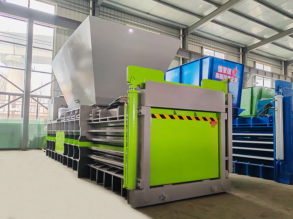 Durable hydraulic baler for compacting various waste materials horizontally.